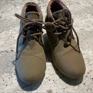 Tan lace-up booties.